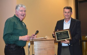 Fran Hutchins, Director of Bracken Cave Preserve, receives the 2015 Community Naturalist award from LMN President Jim Teeling.