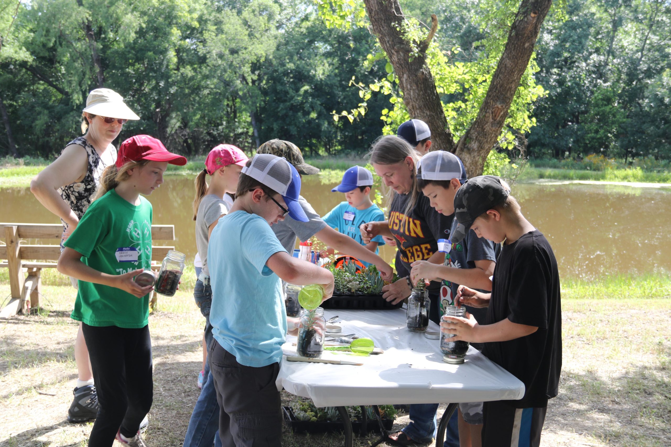 Teach Children about nature by making terrariums during Nature-Ology