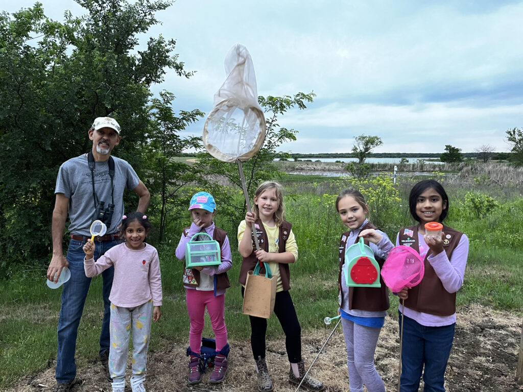 Blackland Prairie Chapter Texas Master Naturalist Greg Tonian at Lewisville Lake Environmental Learning Center with a group of girlscouts.