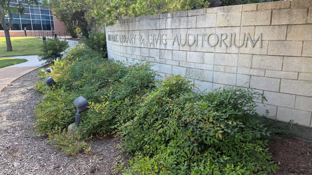 Photo showing the Allen Public Library landscaping bed filled with Nandina