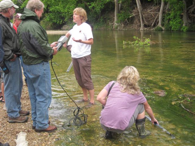 Testing the water quality in Nolan Creek