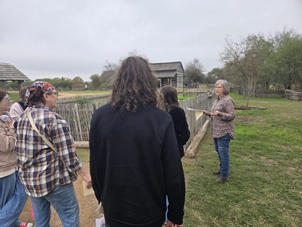 December 2025:  GLC Member Sheri Wilcox talks to students about nature journaling. Photograph by Krystyna Westfield