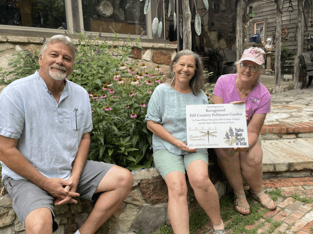 Man, 2 women in Hill Country Pollinator Garden