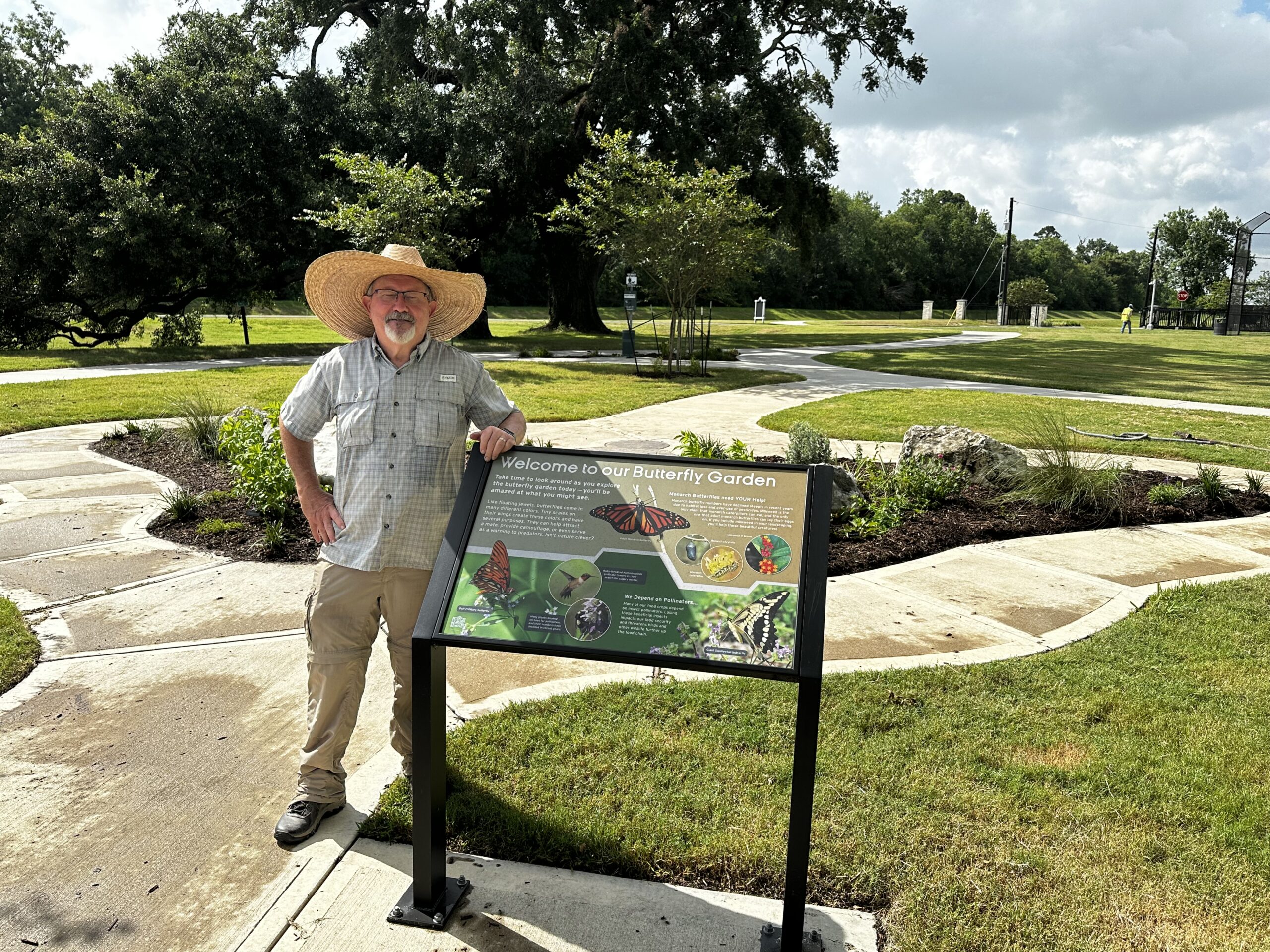 Gary Holmes at the completed butterfly garden