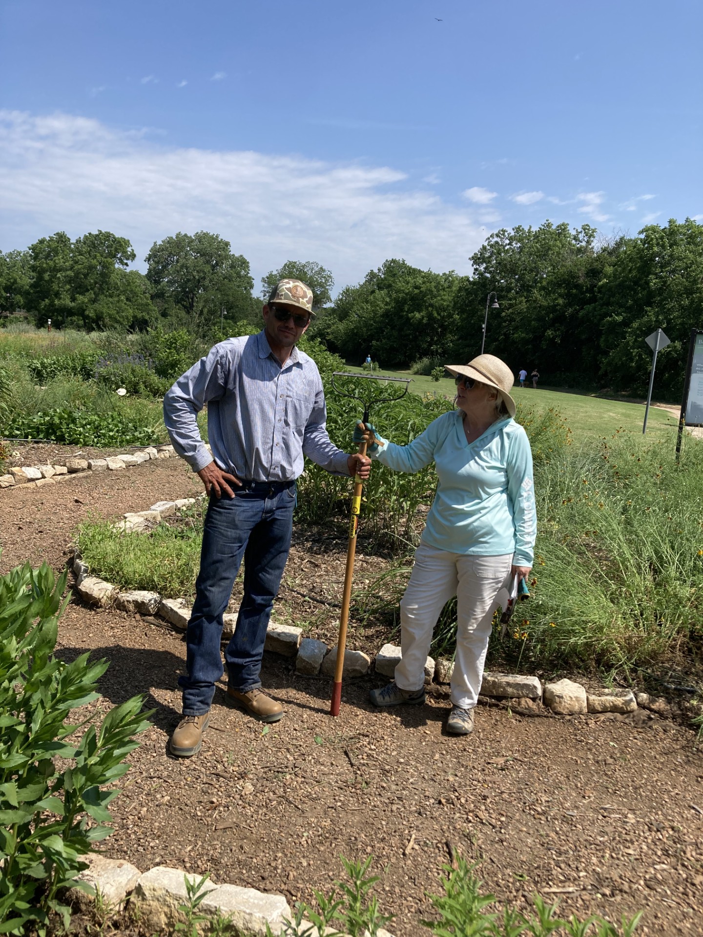 Tanga & Robert at the Bosque River Nature Center helping with the garden