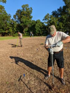 Volunteers moving forward with planting the pollinator garden at the Big Thicket FRSLC in Saratoga.