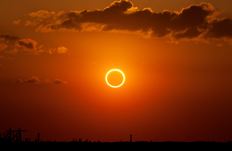 Solar eclipse at sunrise